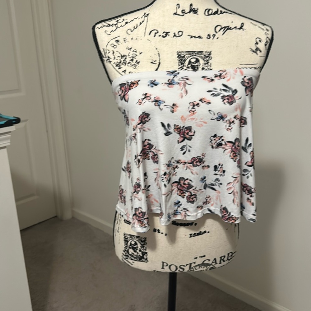 shirt tie on the back. White with flowers